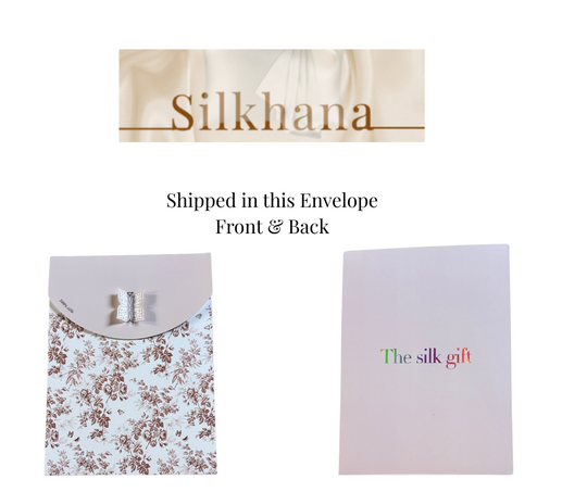 Mulberry silk pillowcases packaged in a designer floral and pastel envelope gift box