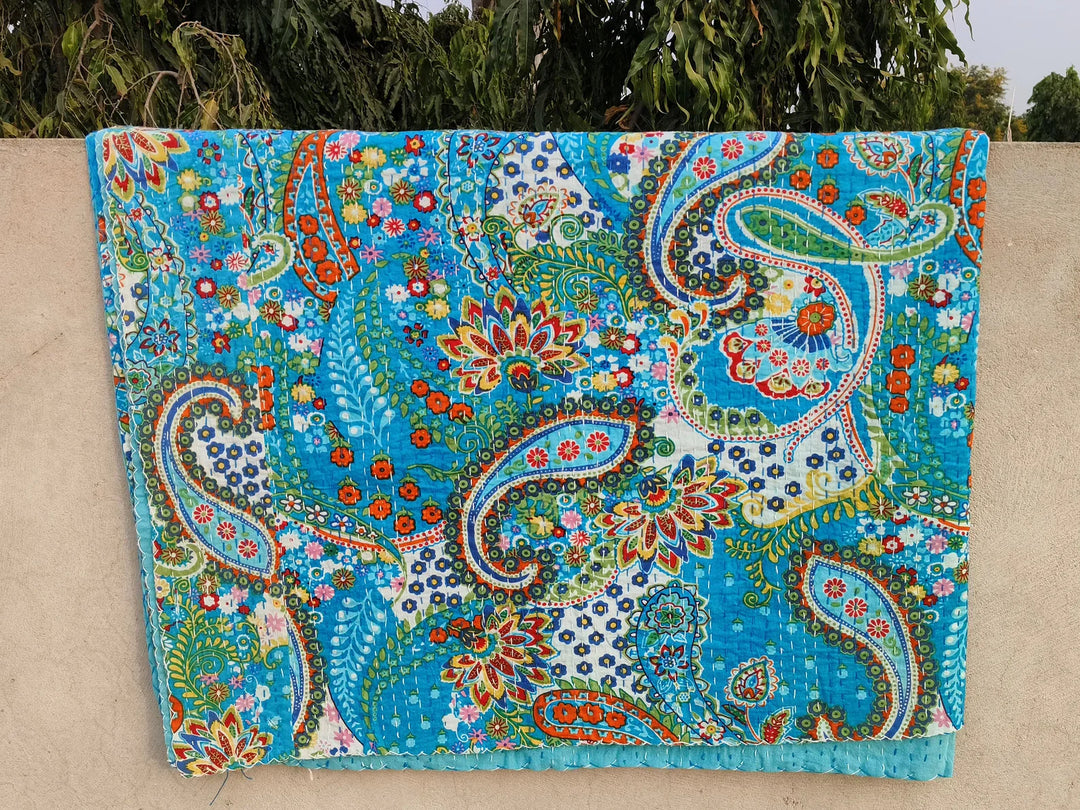 Handmade Kantha Blanket with vibrant blue paisley and floral patterns, lightweight 100% cotton quilt set from India.