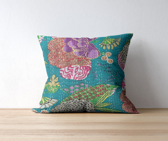 Hand-stitched Kantha throw pillow cover with vibrant floral patterns on teal cotton voile fabric