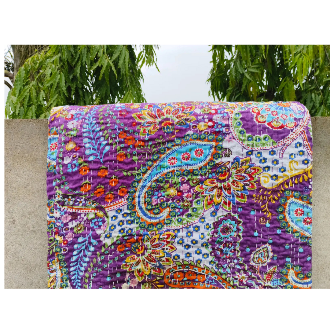 Colorful paisley patterned Kantha blanket made of lightweight, hand-stitched 100% cotton voile with floral and leaf motifs.