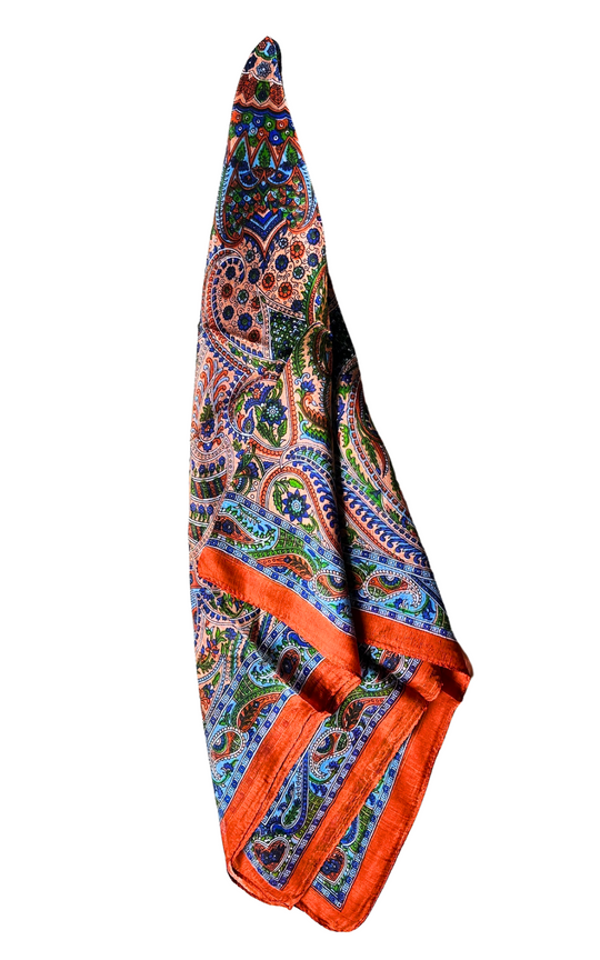 Lightweight silk scarf in bright, vivid colors with hand-hemmed edges.