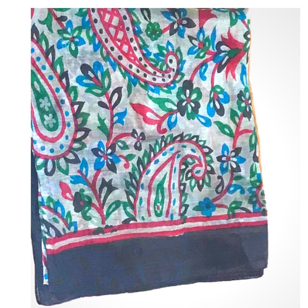 Lightweight hand-hemmed silk scarf with vibrant floral and paisley patterns in bright colors