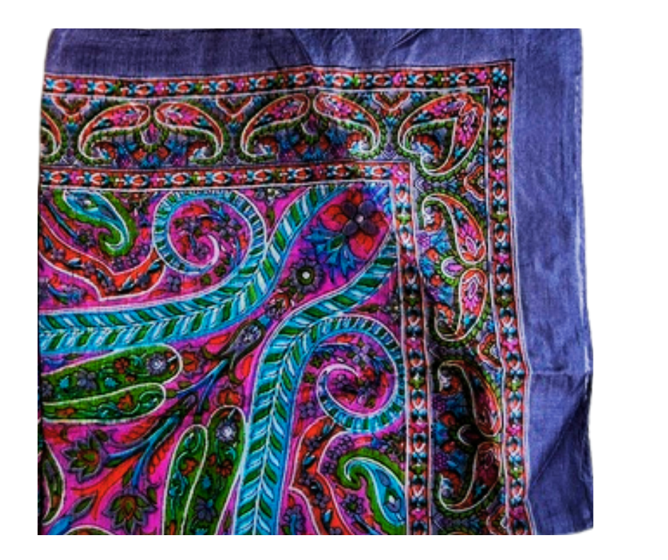 Colorful hand-hemmed lightweight silk scarf with intricate floral patterns and vibrant hues