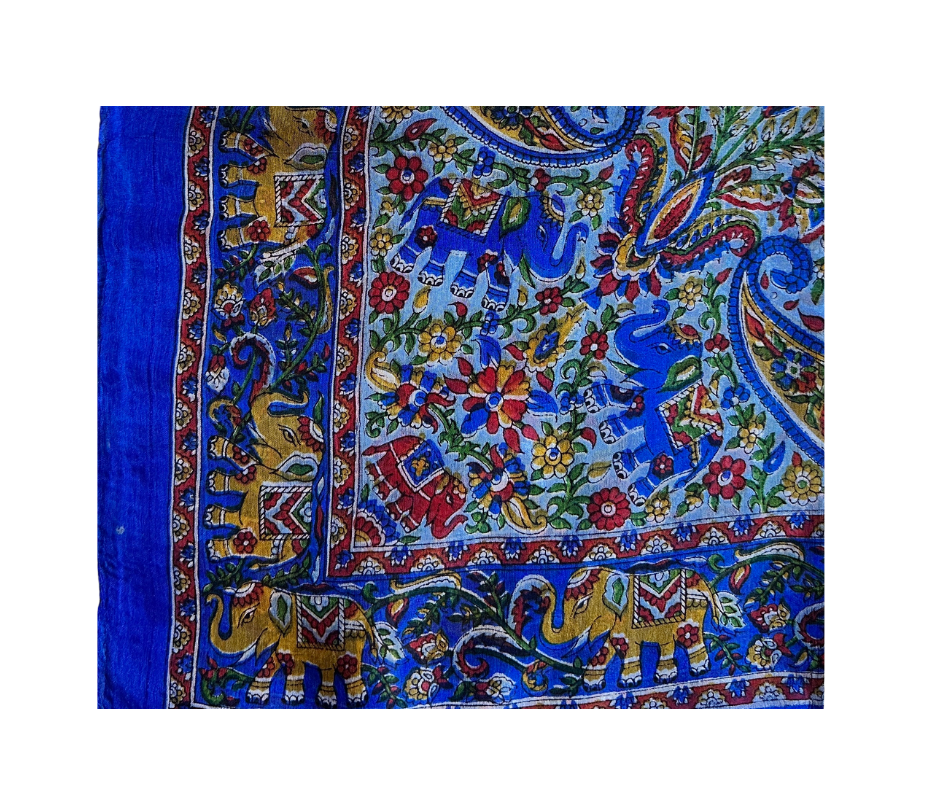 Hand-hemmed lightweight silk scarf with vibrant elephant and floral patterns in blue, red, and yellow hues.