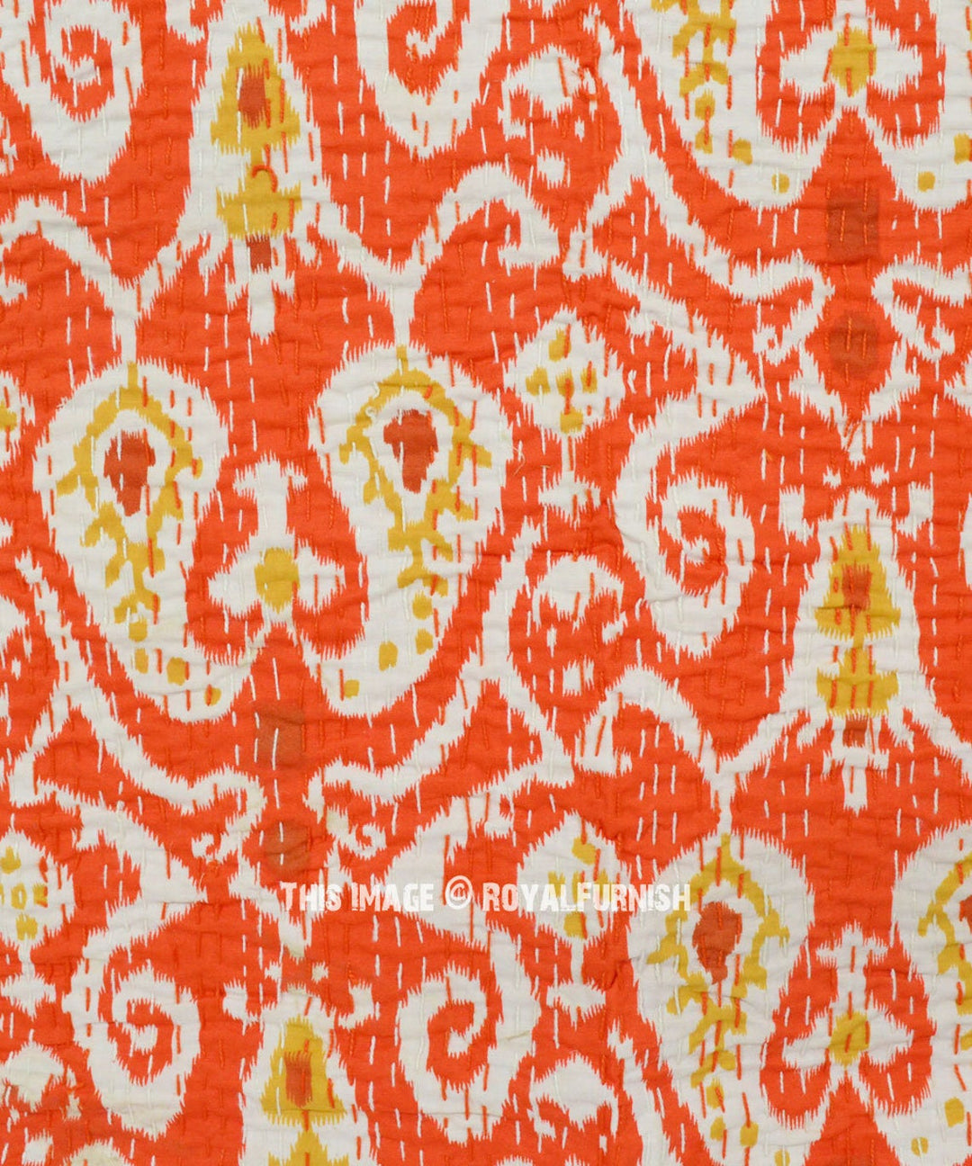 Orange and white ikat design Kantha blanket with hand-stitched quilting, lightweight cotton voile fabric, and traditional Kantha embroidery.
